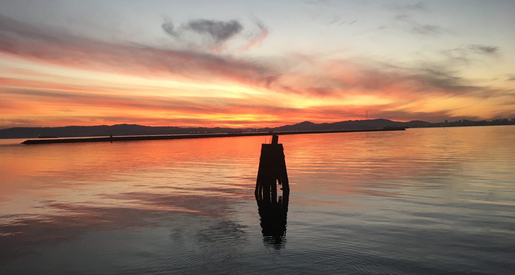 Image cropped of Alameda Seaplane Lagoon at sunset